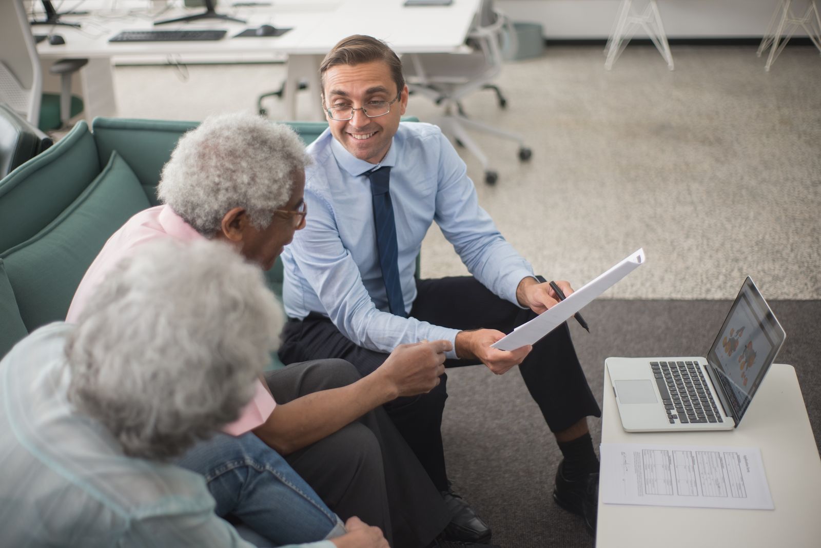 An Ironbridge claims advocate reviewing an estimate with a client